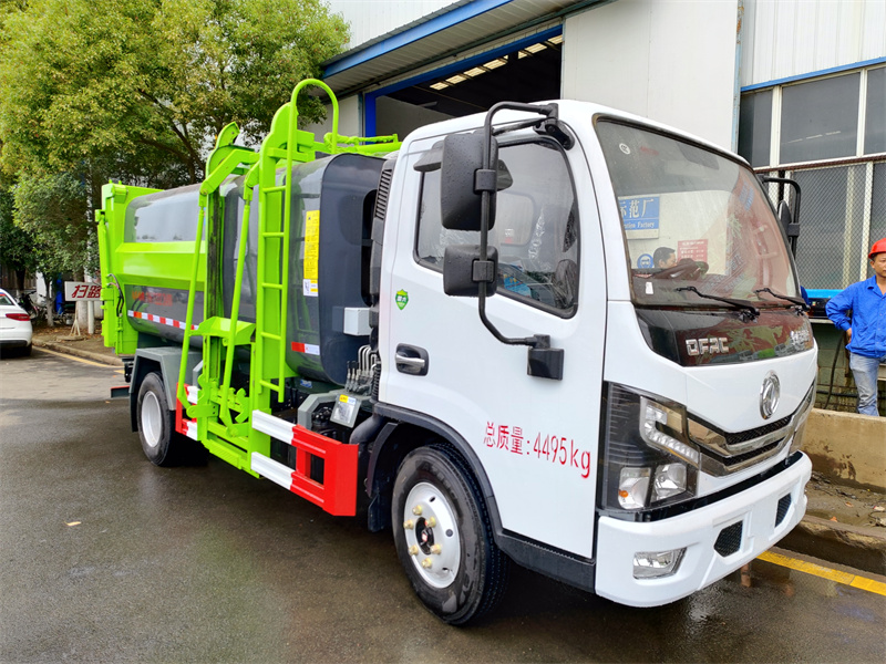 國六7方 藍(lán)牌東風(fēng)D6 側(cè)裝壓縮垃圾車